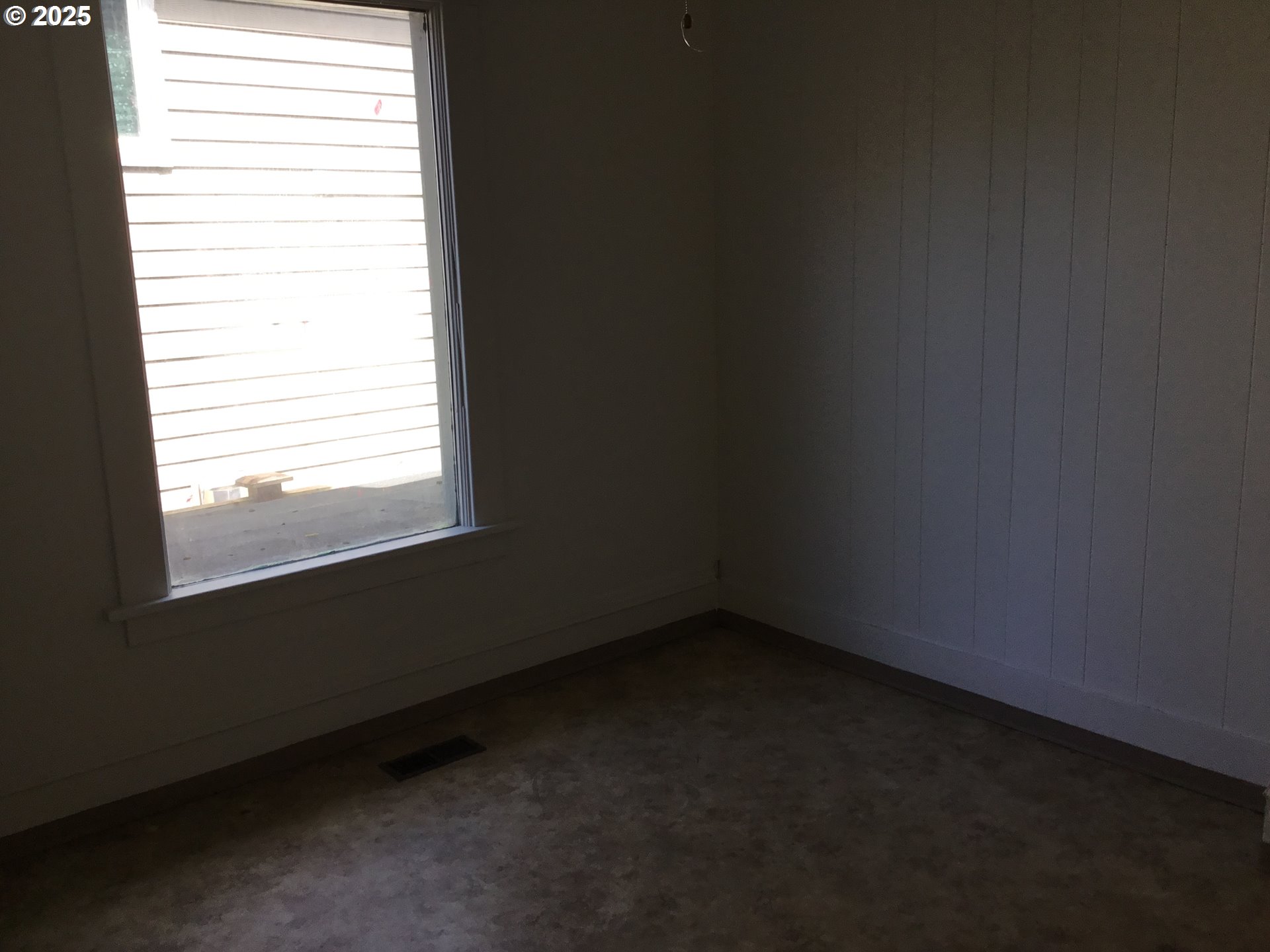 2517 Liberty Street North Bend, OR 97459 - Photo 15 of 42 a view of a room that has a window in it
