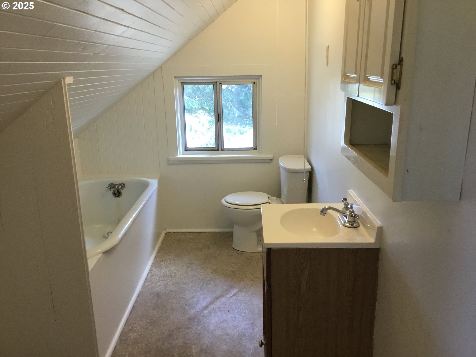 2517 Liberty Street North Bend, OR 97459 - Photo 27 of 42 a bathroom with a sink and a mirror