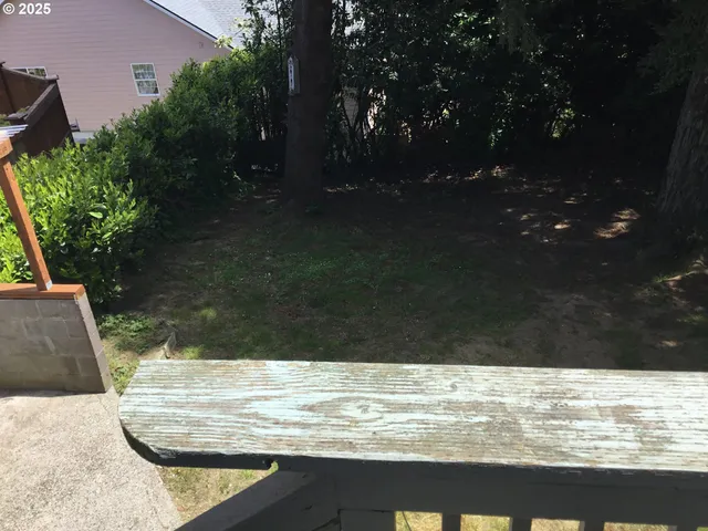 a view of outside space and a yard