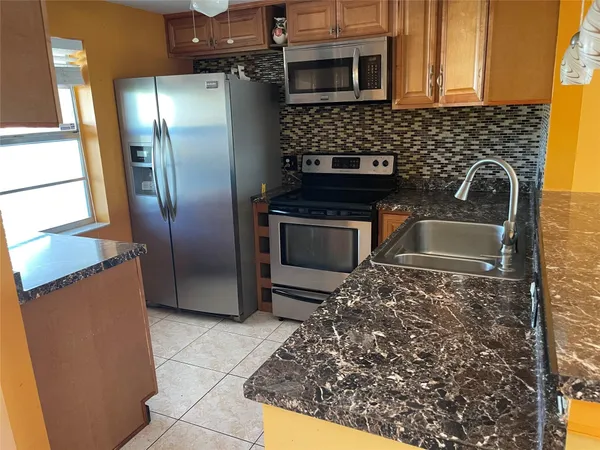 $136,000 | 1025 Country Club Drive, Unit 407, Margate, FL 33063