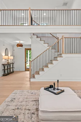a table and chairs in a balcony