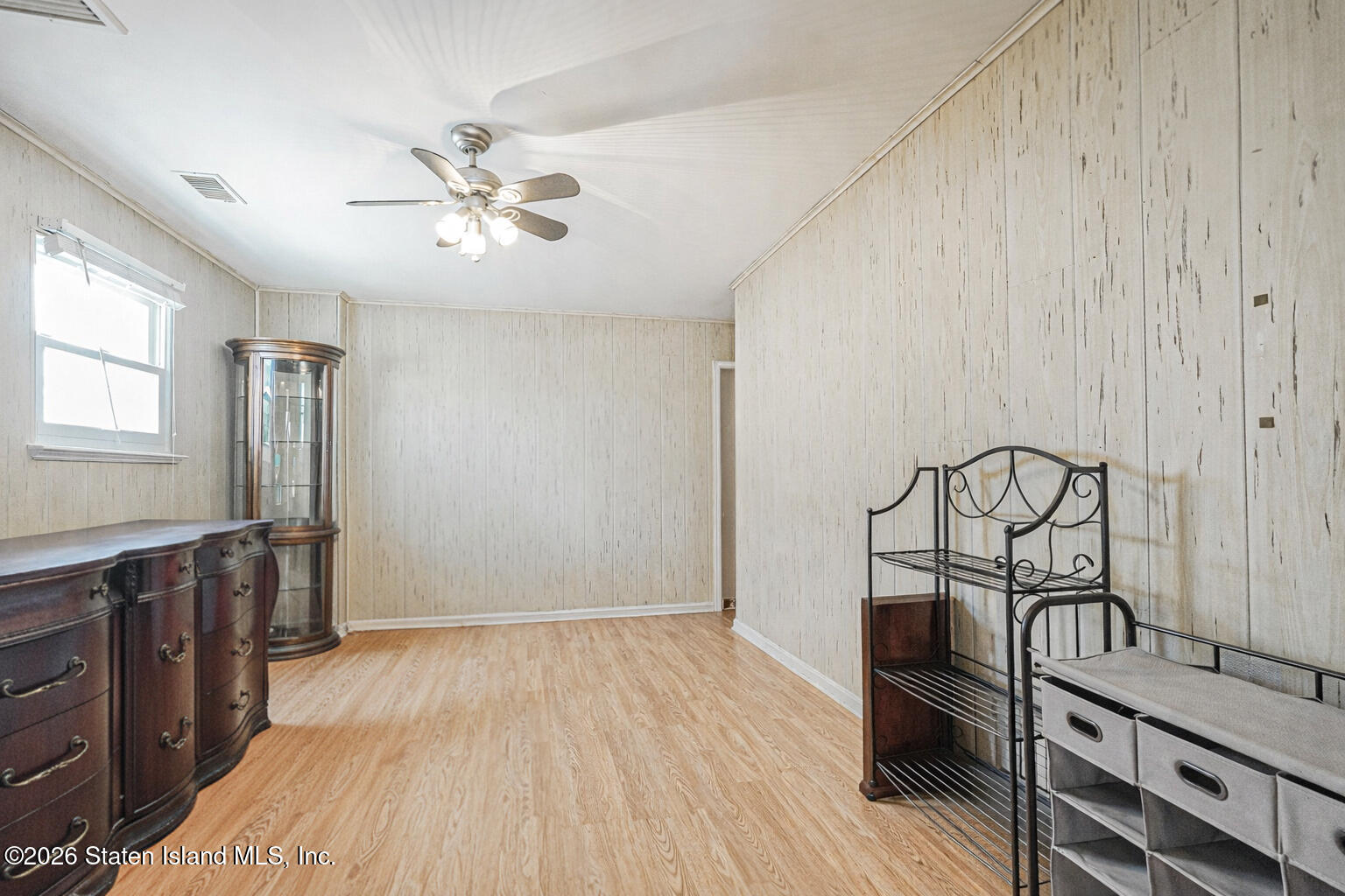 76 Berry Avenue Staten Island, NY 10312 - Photo 24 of 42 wooden floor with chandelier fan