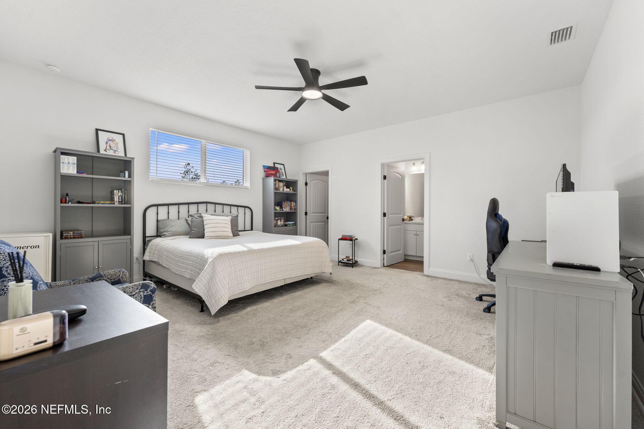 101 Elm Br Road St. Johns, FL 32259 - Photo 41 of 77 a bedroom with a bed and a desk