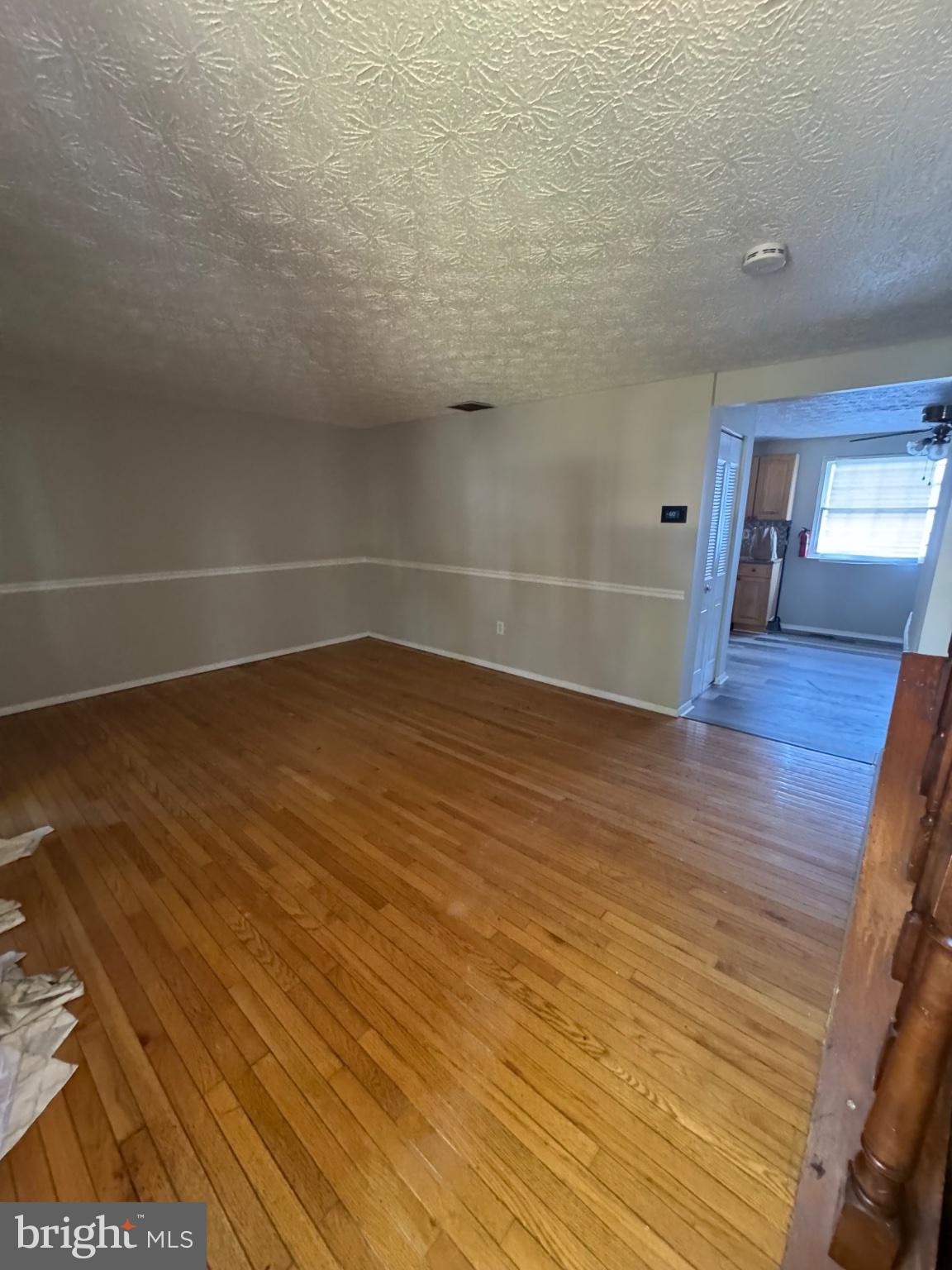 1404 Elm Grove Circle Silver Spring, MD 20905 - Photo 2 of 27 Spacious room with warm wood floors.
