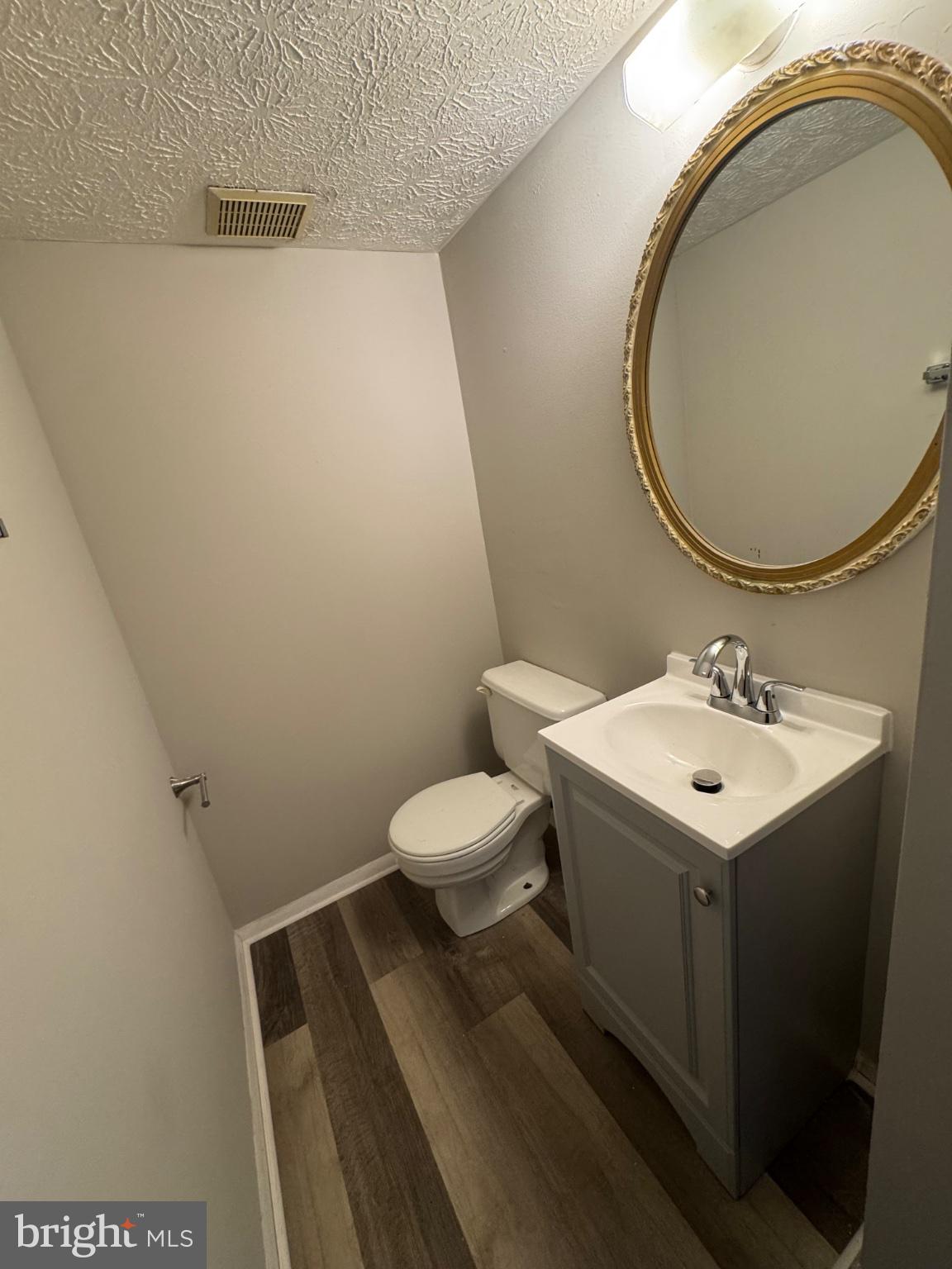 1404 Elm Grove Circle Silver Spring, MD 20905 - Photo 10 of 27 Chic half-bath with modern touches.