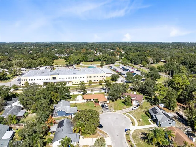 an aerial view of a city with lots of residential buildings