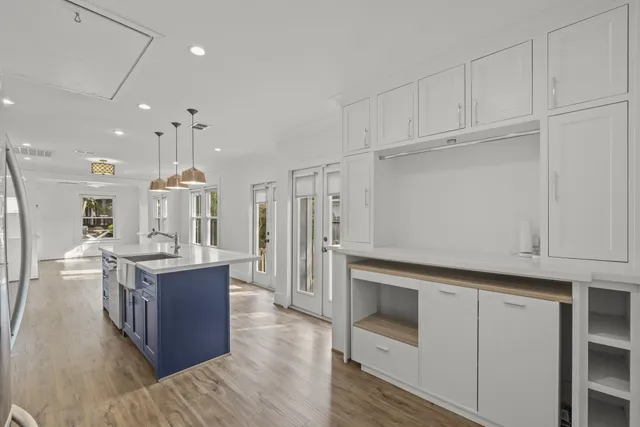 a kitchen with stainless steel appliances granite countertop a stove oven and a refrigerator