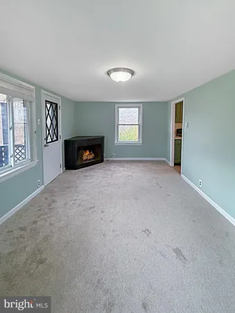 an empty room with windows