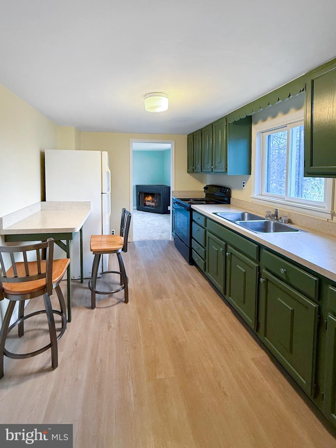 638 State Street Philipsburg, PA 16866 - Photo 5 of 11 a kitchen with a sink cabinets and wooden floor