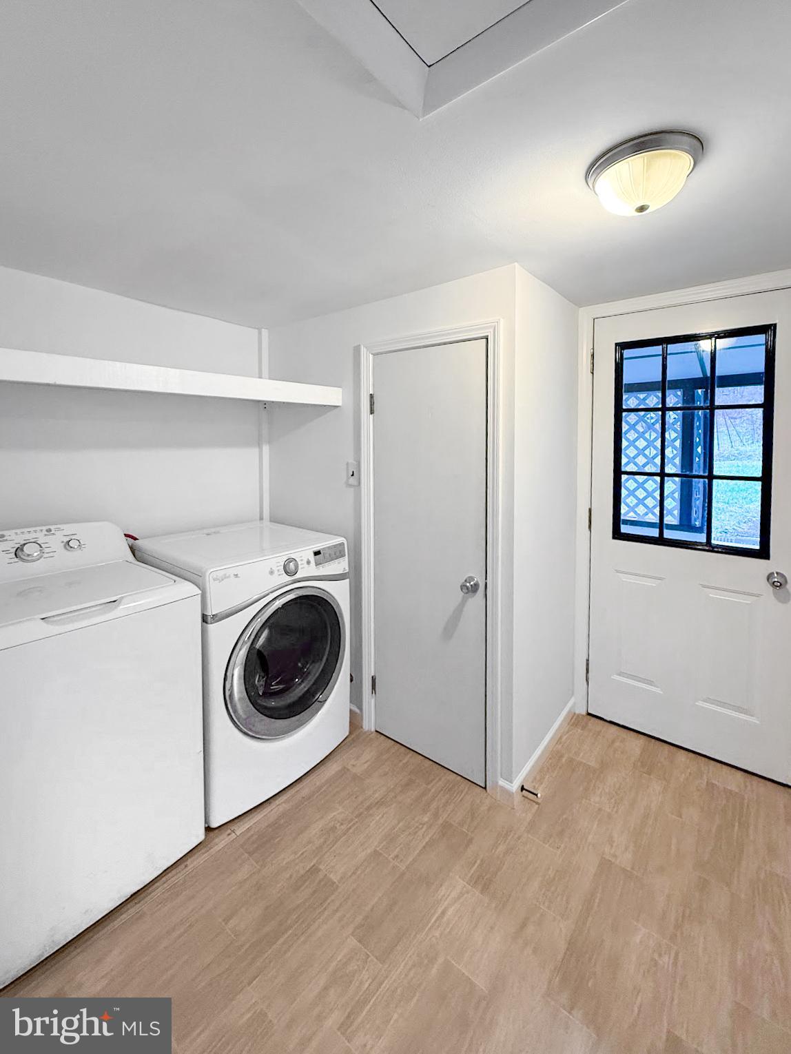638 State Street Philipsburg, PA 16866 - Photo 9 of 11 a view of a storage & utility room with washer and dryer