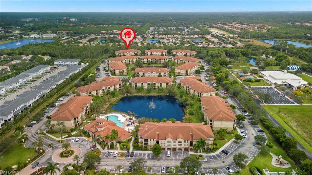 12955 Positano Circle, Unit 104 Naples, FL 34105 - Photo 31 of 40 an aerial view of a city