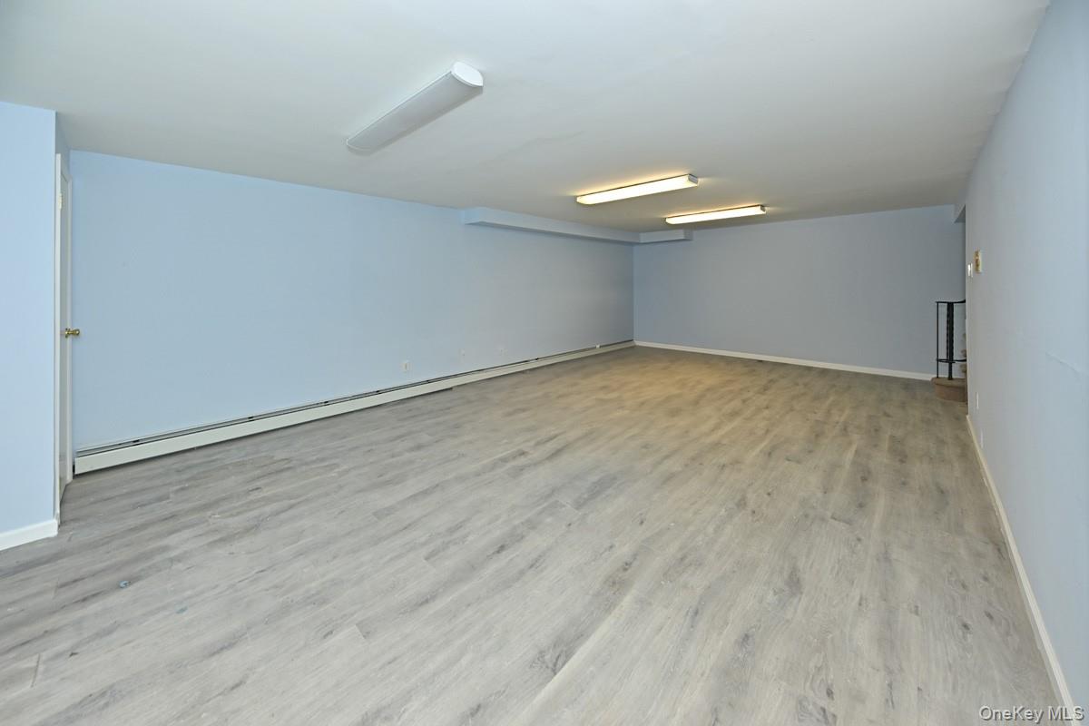 19 Sterling Road Spring Valley, NY 10977 - Photo 17 of 20 wooden floor in an empty room
