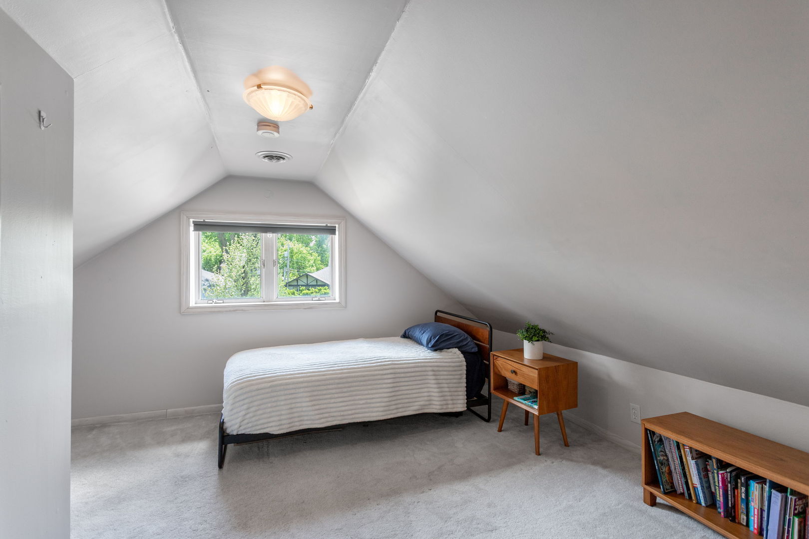 342 Lawton Road Riverside, IL 60546 - Photo 16 of 33 a bedroom with a bed and a window