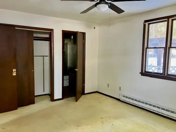 an empty room with windows