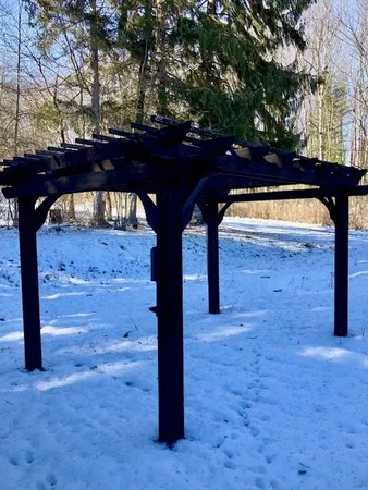 a view of a wooden floor and a small yard