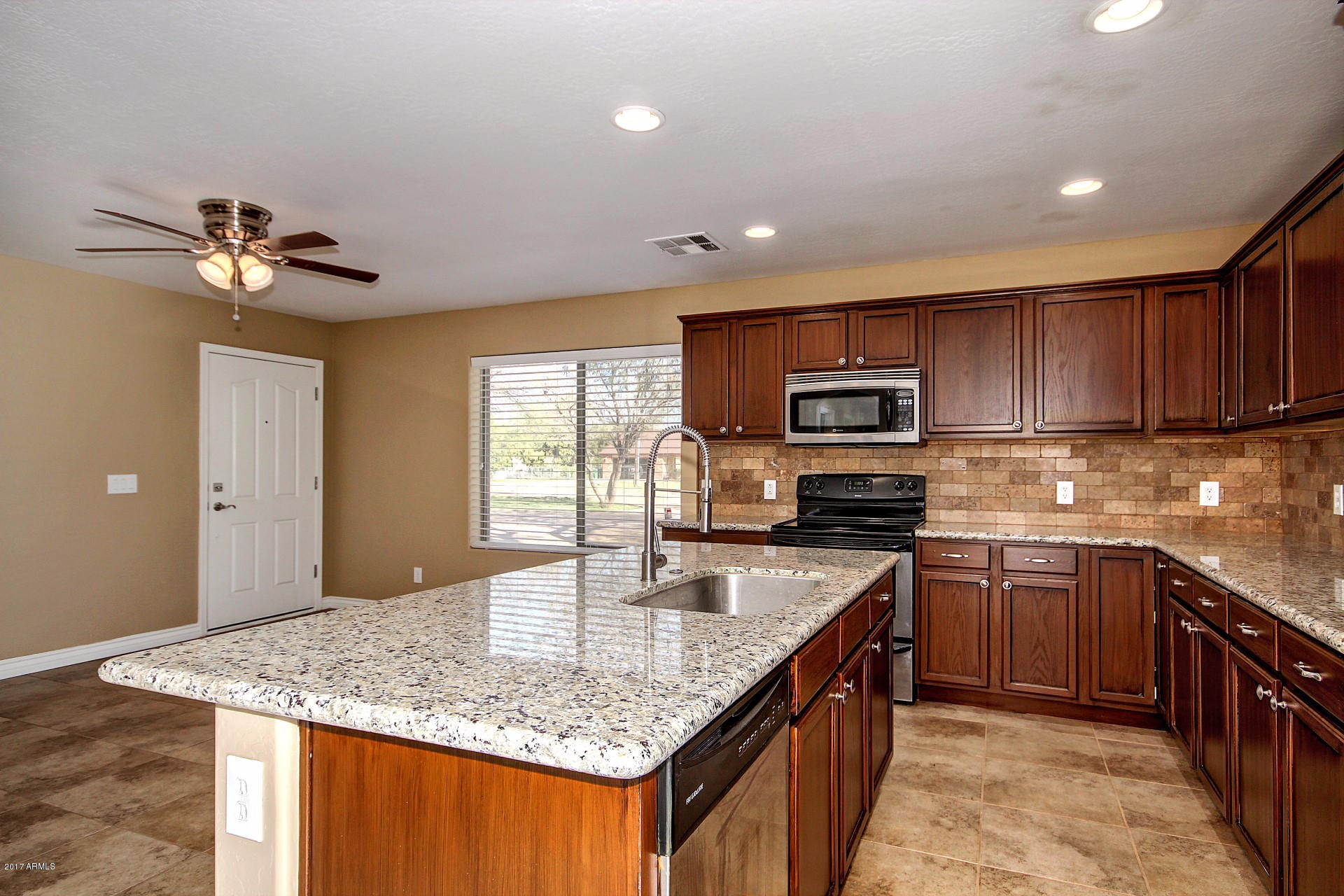 17743 East Brooks Farm Road Gilbert, AZ 85298 - Photo 31 of 69 GUEST HOUSE KITCHEN / FAMILY ROOM