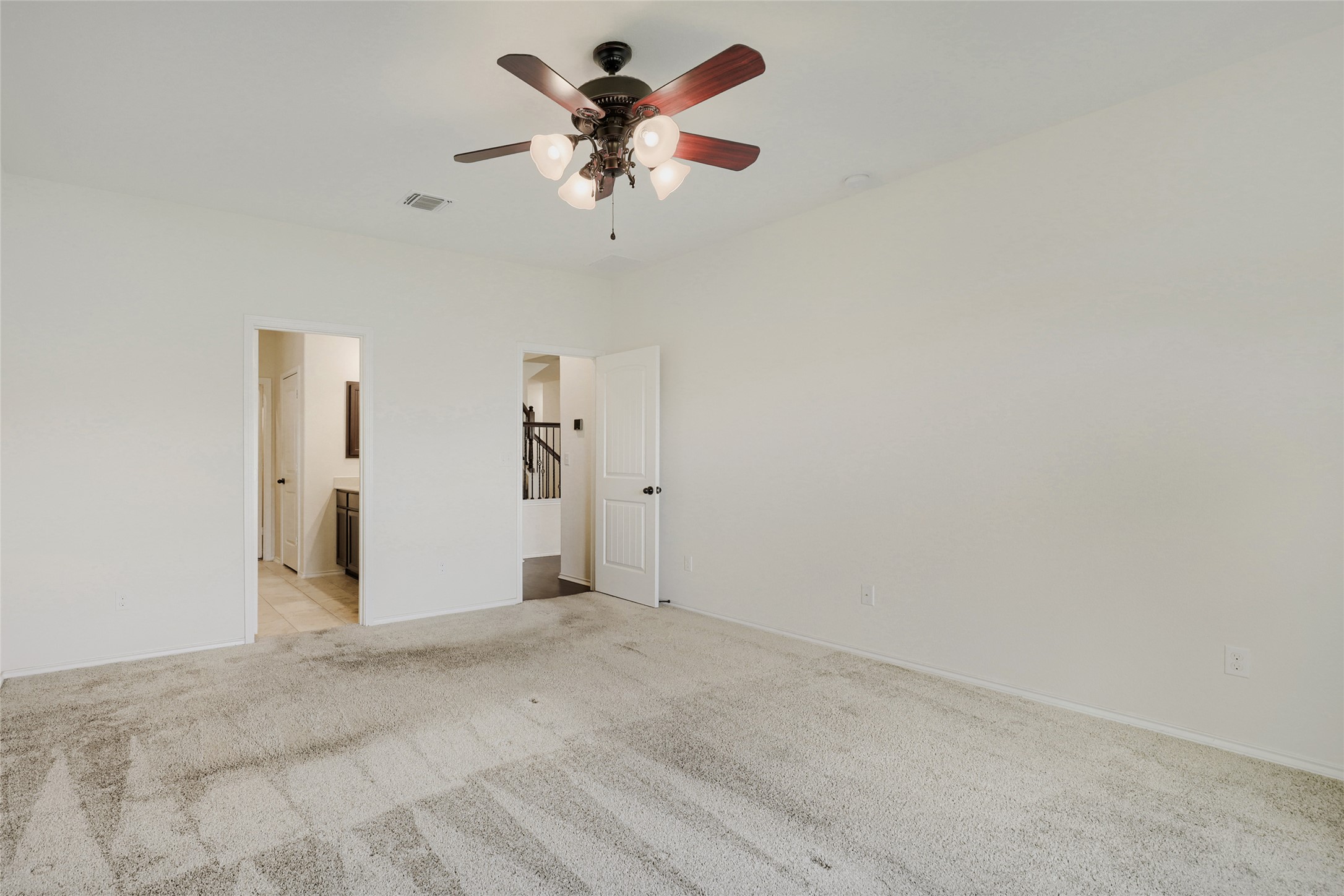 104 Kavanaugh Street Georgetown, TX 78628 - Photo 11 of 30 Downstairs primary located at the back of the home