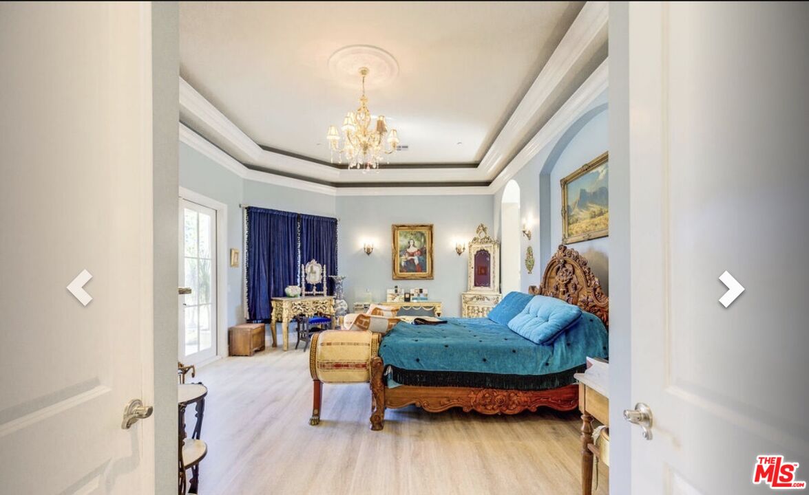 232 Saddlebow Road Bell Canyon, CA 91307 - Photo 4 of 20 a living room with furniture and wooden floor