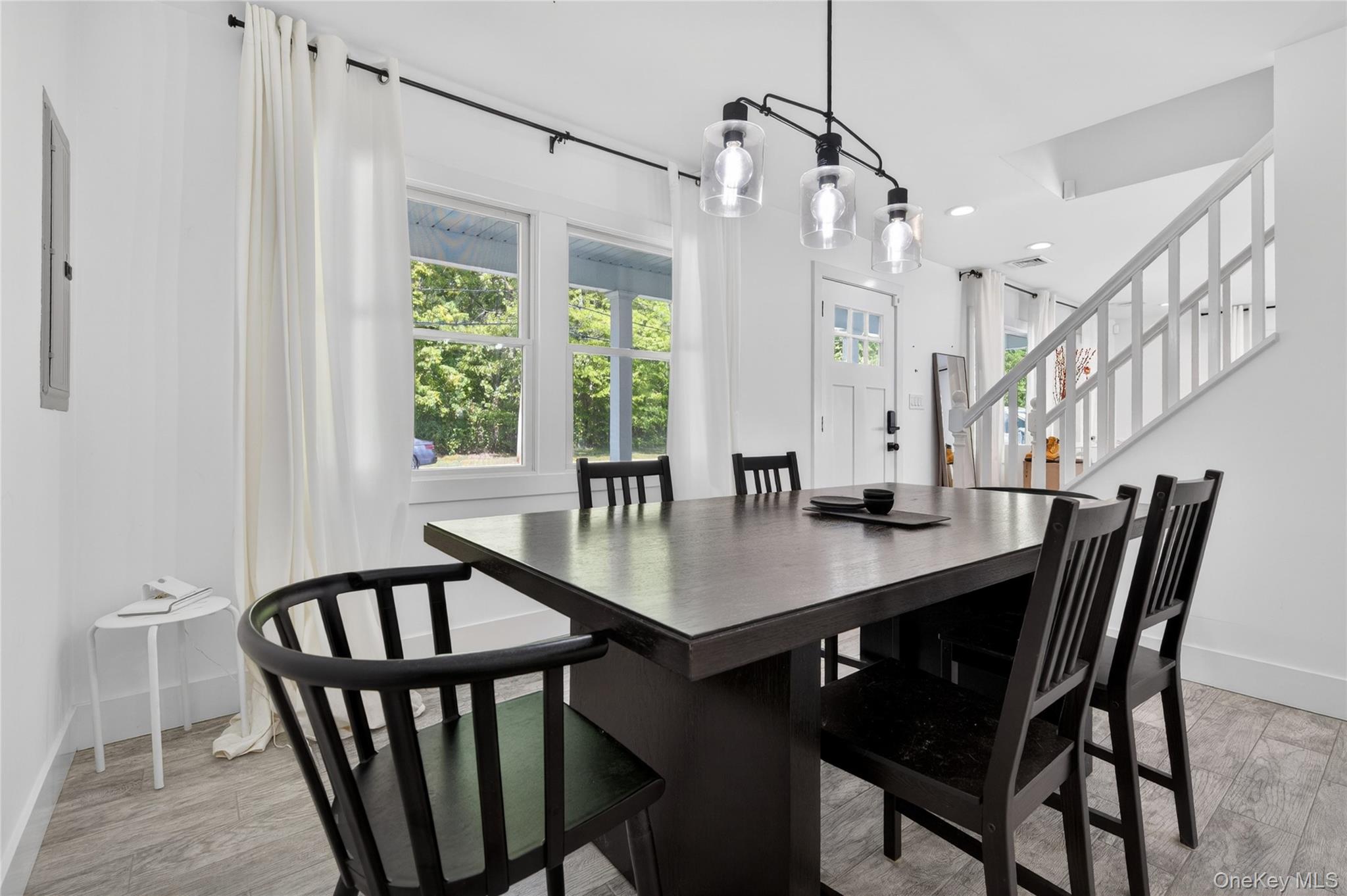 534 Riverside Avenue Massapequa, NY 11758 - Photo 12 of 28 a view of a dining room and furniture window and wooden floor