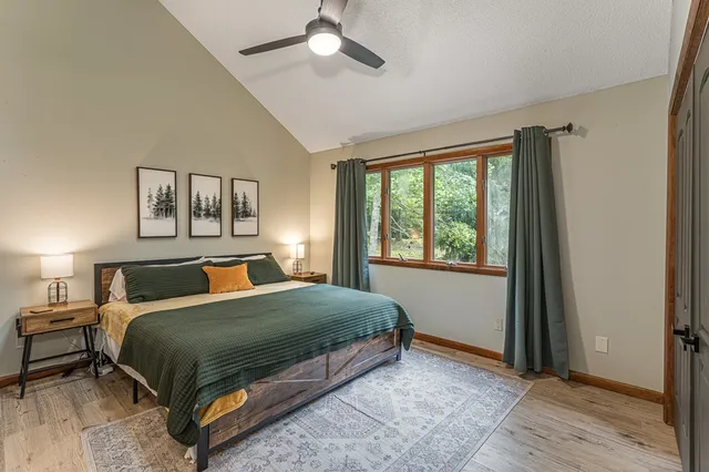 a kitchen with stainless steel appliances granite countertop a stove and a wooden cabinets