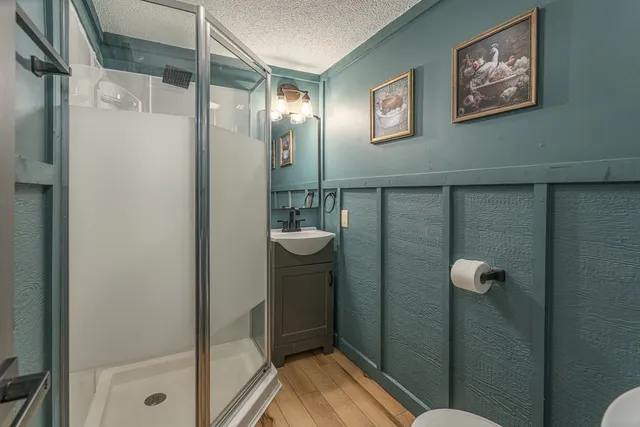 a backyard of a house with lots of trees