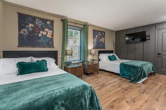 a house view with a sitting space and garden space