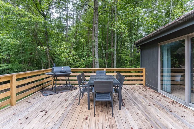 a backyard of a house with seating space