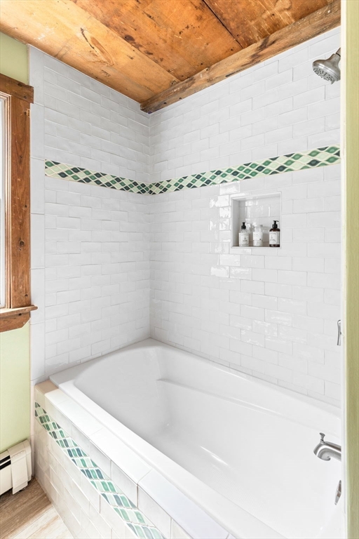1020 Old Falmouth Road Barnstable, MA 02632 - Photo 30 of 42 a bathroom with a bath tub
