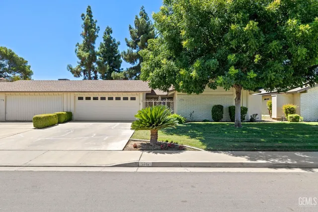 a house view with a garden space