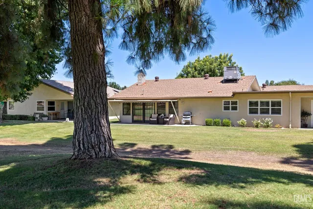 a view of a house with a swimming pool