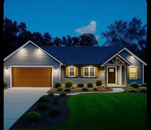 a front view of house with yard and green space