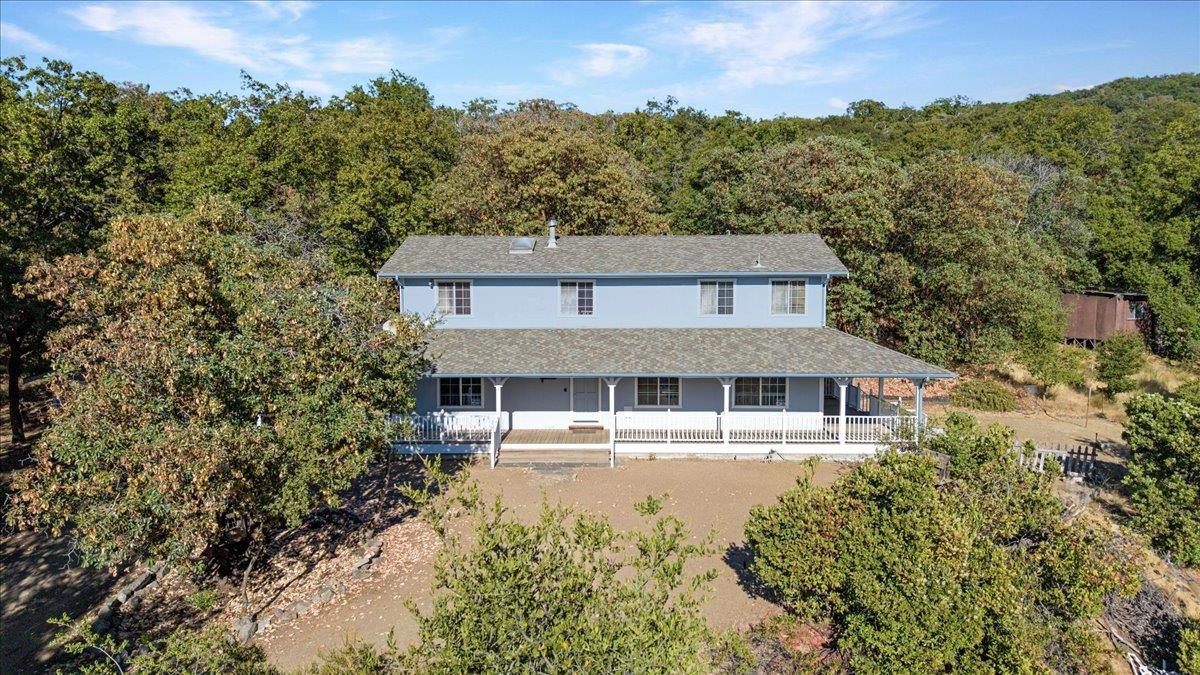 40101 Tassajara Road Carmel Valley, CA 93924 - Photo 4 of 91 front view of a house with a yard