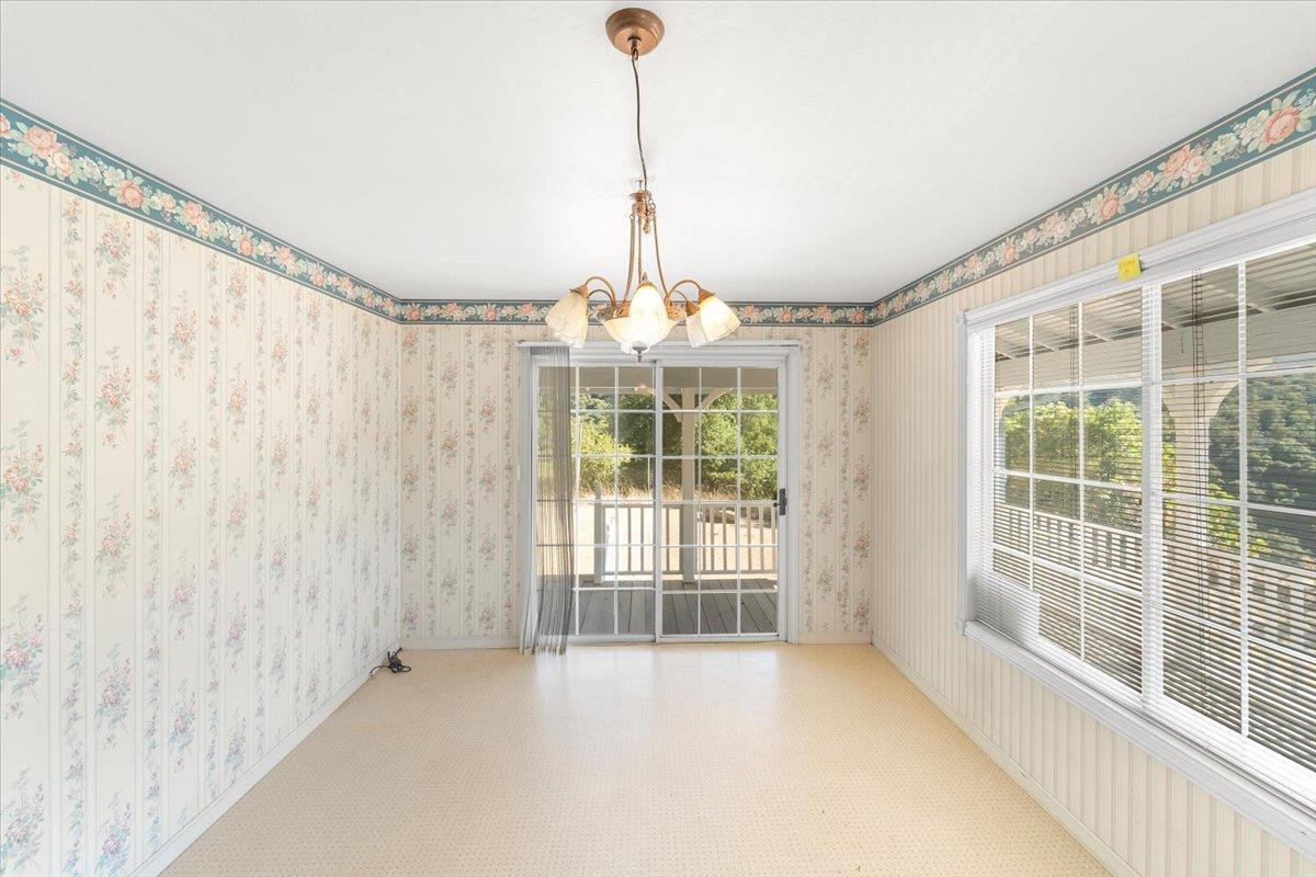 40101 Tassajara Road Carmel Valley, CA 93924 - Photo 51 of 91 a view of an empty room with windows