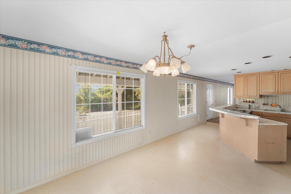 40101 Tassajara Road Carmel Valley, CA 93924 - Photo 53 of 91 a view of a kitchen with a sink cabinets and a window