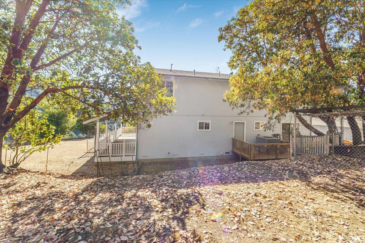 40101 Tassajara Road Carmel Valley, CA 93924 - Photo 71 of 91 a view of a backyard with large trees
