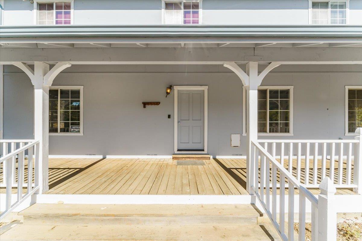 40101 Tassajara Road Carmel Valley, CA 93924 - Photo 87 of 91 a view of a house with a balcony