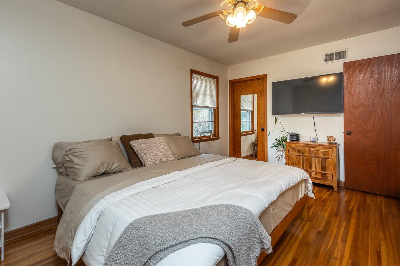 1604 Wilbec Road Memphis, TN 38117 - Photo 12 of 30 a spacious bedroom with a bed and a view of kitchen