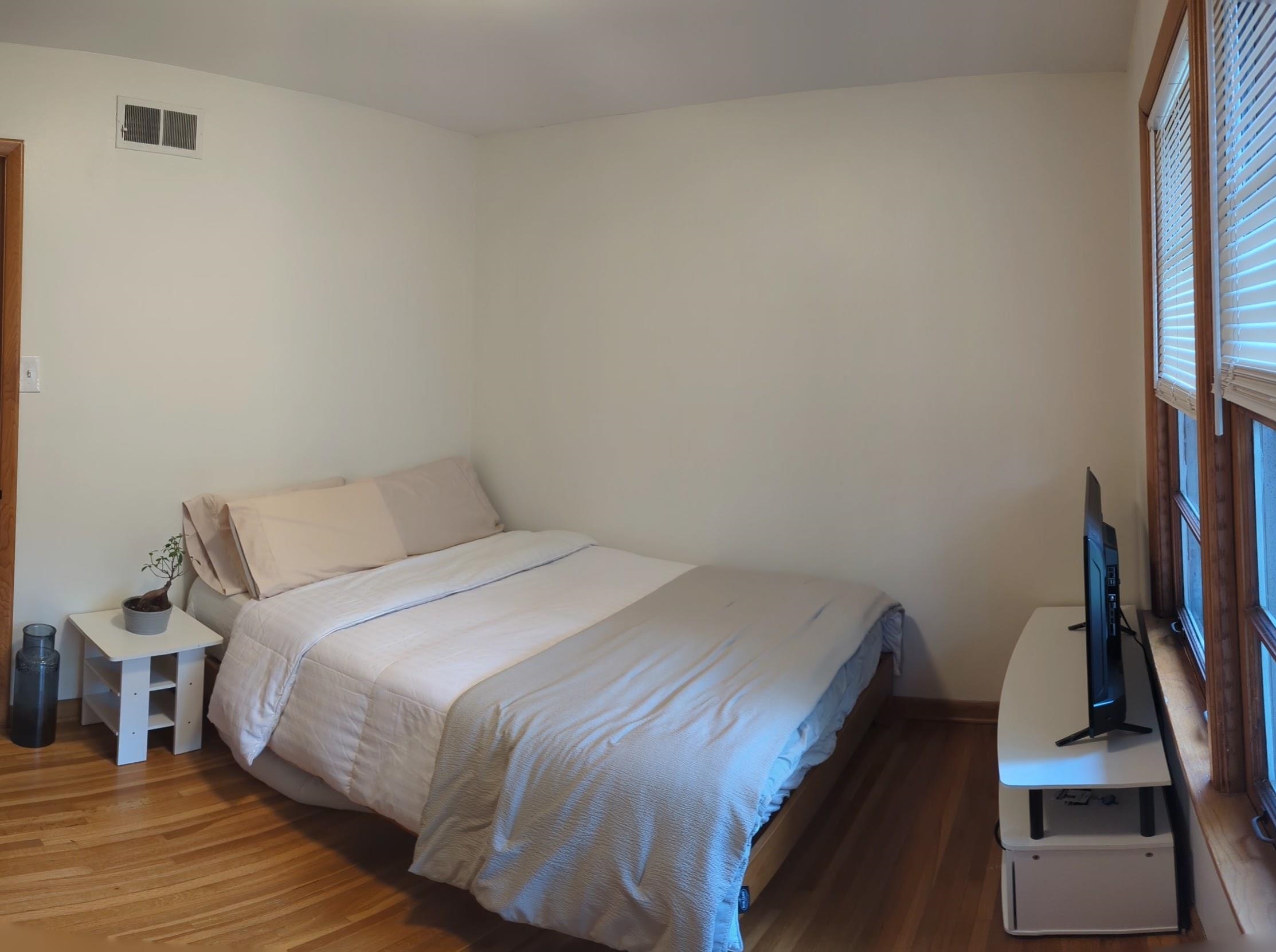 1604 Wilbec Road Memphis, TN 38117 - Photo 15 of 30 a bed sitting in a bedroom next to a window