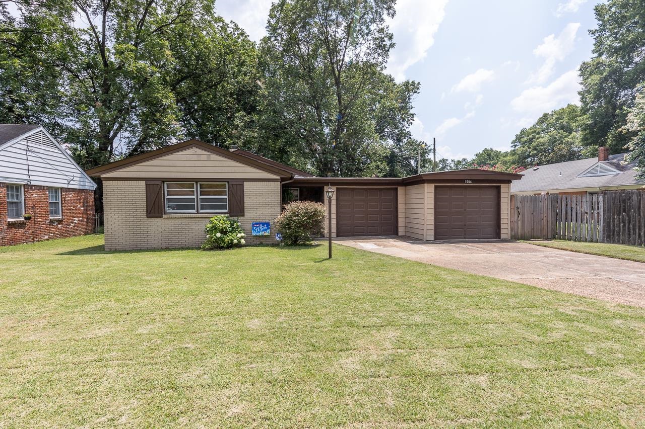 1604 Wilbec Road Memphis, TN 38117 - Photo 25 of 30 a front view of a house with a garden