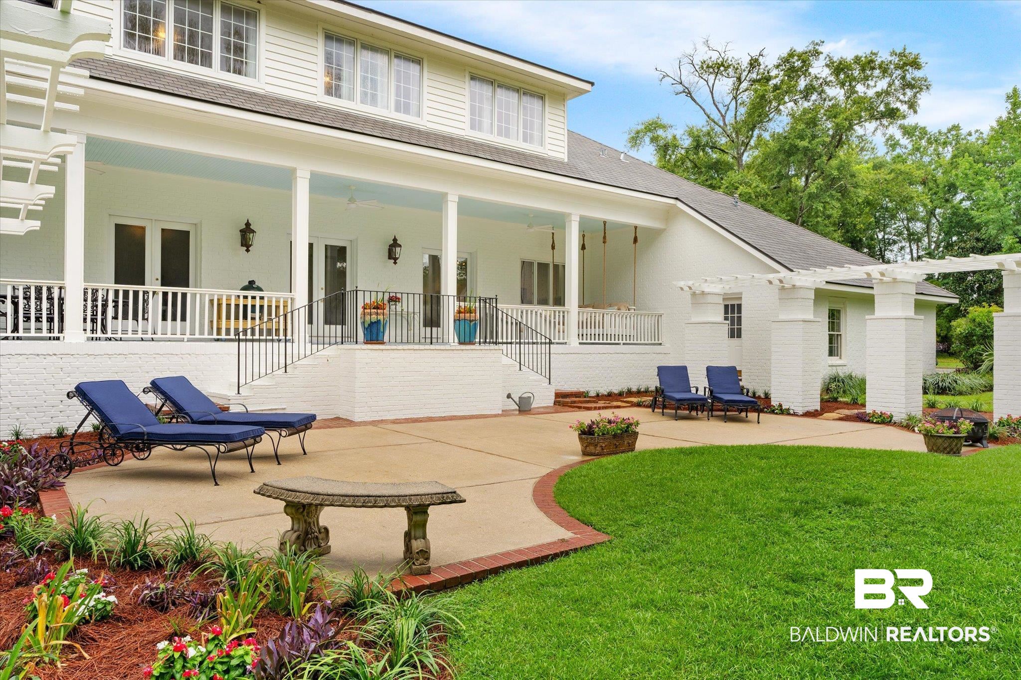 6458 Raintree Road Fairhope, AL 36532 - Photo 43 of 65 Back of house featuring a patio and a yard