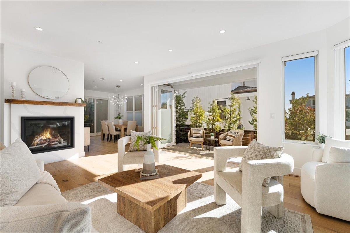 100 Bay Crest Road Santa Cruz, CA 95062 - Photo 14 of 62 a living room with furniture a fireplace and a large window