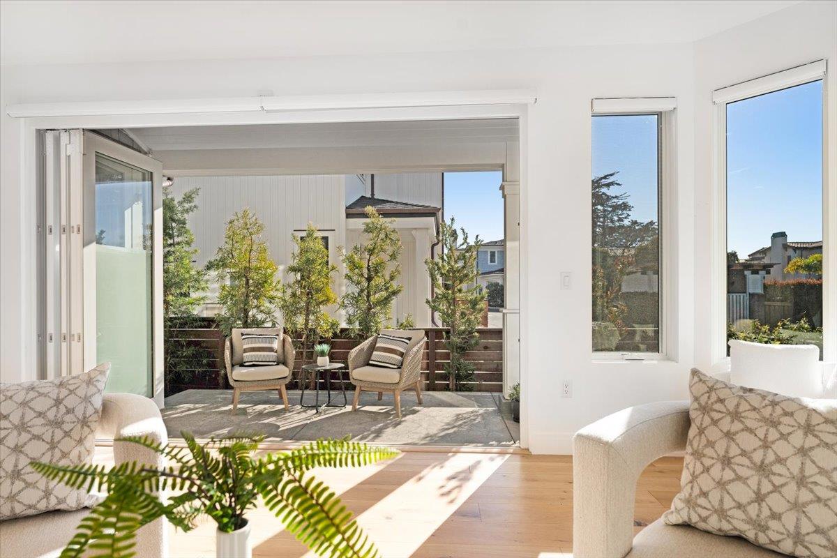 100 Bay Crest Road Santa Cruz, CA 95062 - Photo 19 of 62 a living room with furniture and a window