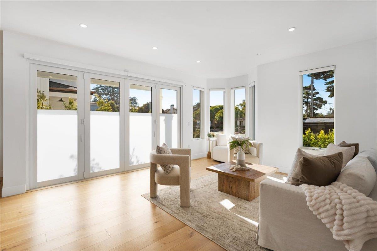 100 Bay Crest Road Santa Cruz, CA 95062 - Photo 20 of 62 a living room with furniture and large windows