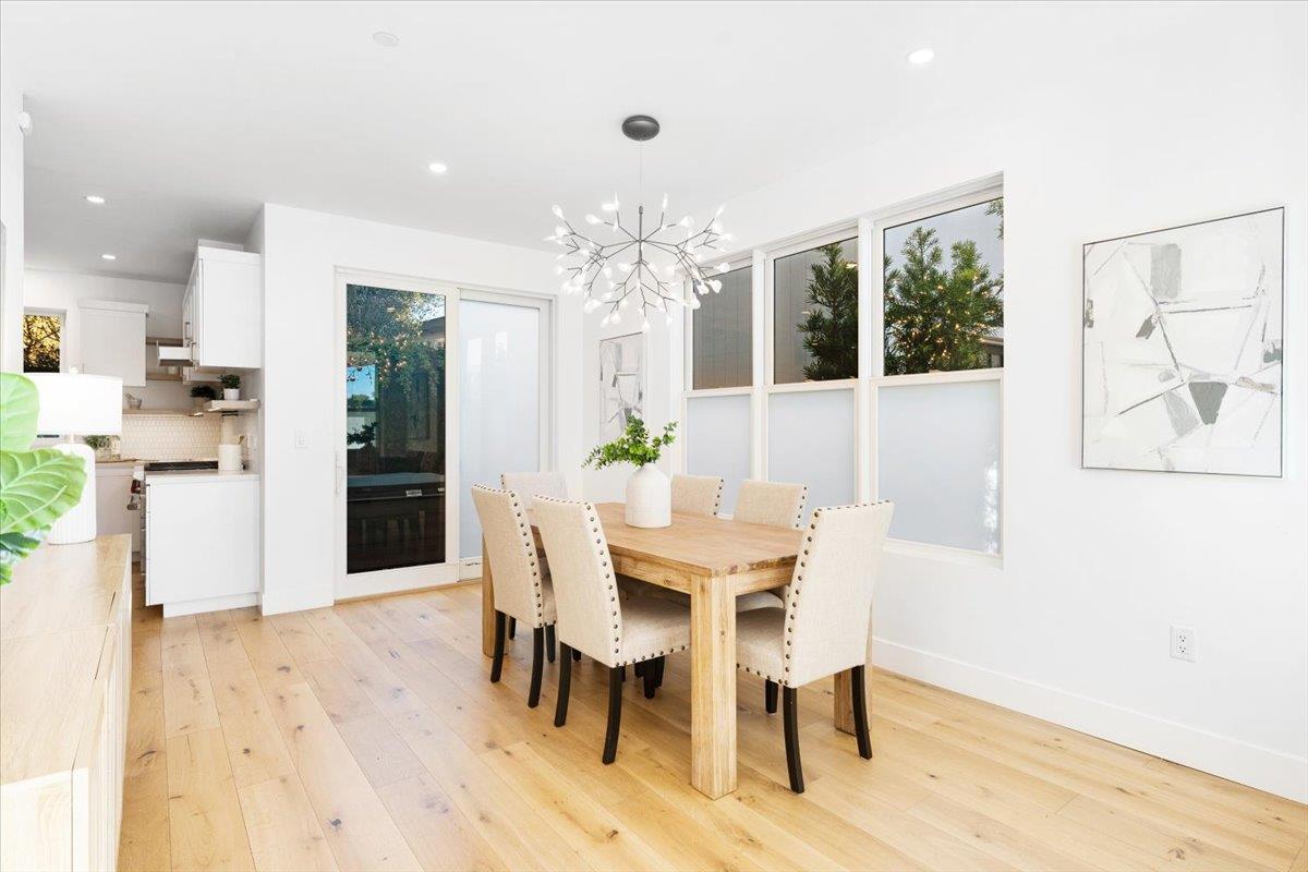 100 Bay Crest Road Santa Cruz, CA 95062 - Photo 23 of 62 a view of a dining room with furniture and chandelier