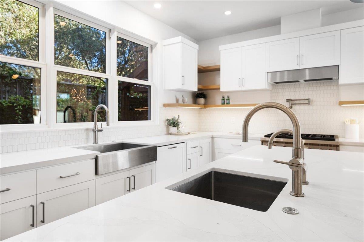 100 Bay Crest Road Santa Cruz, CA 95062 - Photo 28 of 62 a kitchen with a sink and cabinets