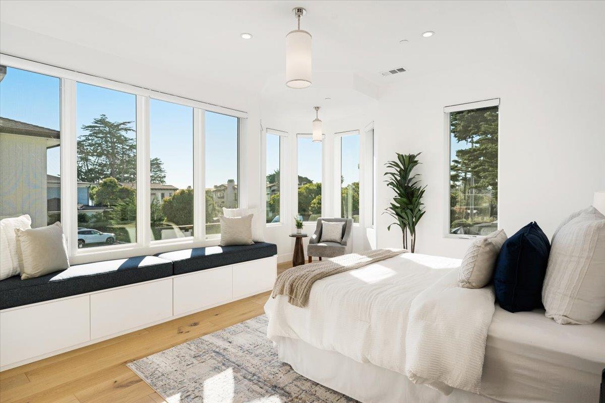 100 Bay Crest Road Santa Cruz, CA 95062 - Photo 33 of 62 a large bedroom with a large bed and a large window