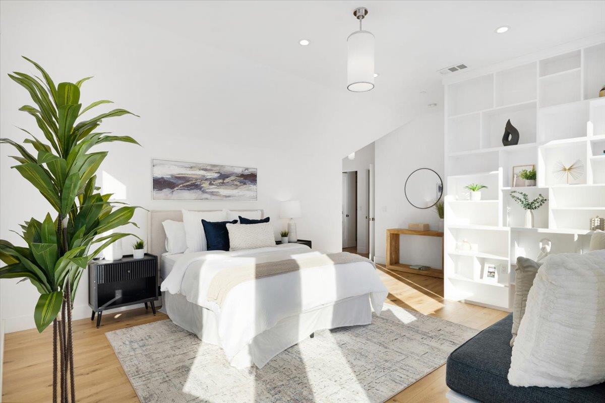 100 Bay Crest Road Santa Cruz, CA 95062 - Photo 34 of 62 a living room with a couch and a potted plant