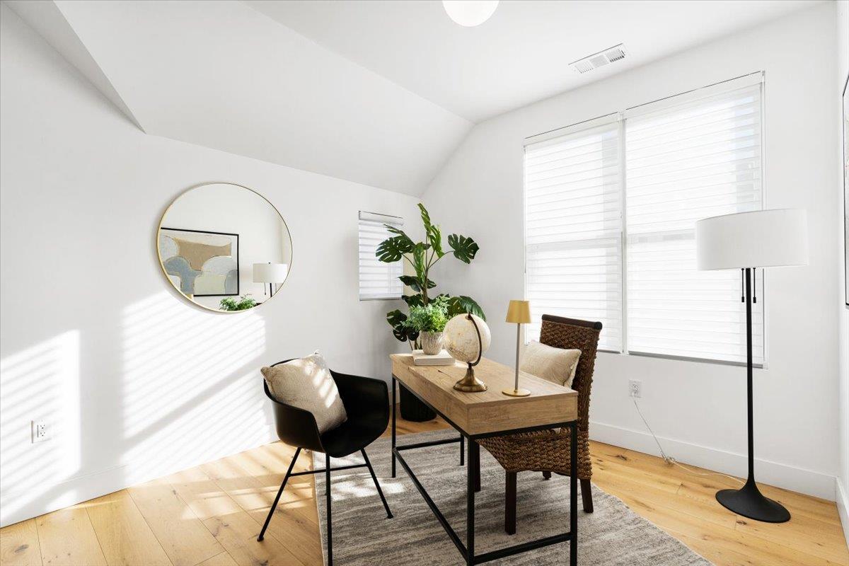 100 Bay Crest Road Santa Cruz, CA 95062 - Photo 48 of 62 a workspace with furniture and a potted plant