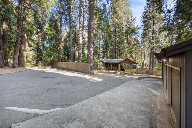 a view of a house with a street