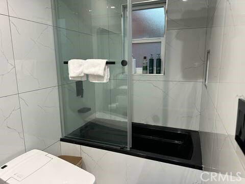 5032 Amestoy Encino, CA 91316 - Photo 19 of 22 a bathroom with a sink a toilet and shower